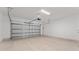 Spacious garage equipped with an automatic door and lighting at 288 N Oak Ave, Sanford, FL 32771