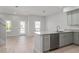 Beautiful kitchen features stainless steel dishwasher, granite countertops, and open plan at 288 N Oak Ave, Sanford, FL 32771