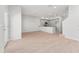 Open-plan living space featuring a modern kitchen with wood floors at 288 N Oak Ave, Sanford, FL 32771