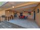 Spacious covered back patio is perfect for outdoor entertaining and dining with its stylish furniture set at 2940 N Huron Dr, Deltona, FL 32738