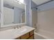 Cozy bathroom featuring a vanity with ample lighting and a shower-tub combination at 2940 N Huron Dr, Deltona, FL 32738