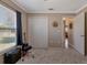 Bedroom featuring large closet, a window, and guitar on the floor at 2940 N Huron Dr, Deltona, FL 32738