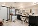 Bathroom features black and white accents, dual sinks, a vanity, and shower at 3970 Sw 51St Ter, Ocala, FL 34474