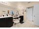 Bathroom featuring dual sinks, a vanity, and white cabinets at 3970 Sw 51St Ter, Ocala, FL 34474