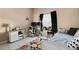 Cozy bedroom offers natural light and a comfortable workspace at 3970 Sw 51St Ter, Ocala, FL 34474