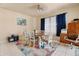 The dining room includes modern furniture and a colorful rug at 3970 Sw 51St Ter, Ocala, FL 34474
