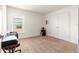 Bright bedroom with neutral carpet and walls, complemented by natural light at 4881 Se 91St Pl, Ocala, FL 34480
