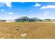Charming single-story home with a well-maintained front yard and classic blue exterior paint at 4881 Se 91St Pl, Ocala, FL 34480