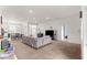Bright living area connected to the dining space, featuring a comfortable sofa and lots of natural light at 4881 Se 91St Pl, Ocala, FL 34480