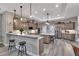 Gourmet kitchen features stainless steel appliances, granite counters, and a large island with seating at 5090 Nw 80Th Avenue Rd, Ocala, FL 34482