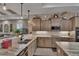 A kitchen featuring granite countertops, stainless steel appliances, and modern cabinetry at 5090 Nw 80Th Avenue Rd, Ocala, FL 34482