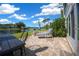 A tranquil patio featuring a lake view, seating area, and space for outdoor relaxation and entertaining at 515 Midway Dr # A, Ocala, FL 34472