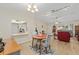 Cozy dining area with open view into the living room at 8237 108Th Street Sw Rd, Ocala, FL 34481