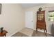 Cozy entryway featuring a vintage cabinet and tile transition at 8237 108Th Street Sw Rd, Ocala, FL 34481