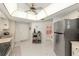 Well-lit kitchen featuring stainless steel appliances and unique overhead lighting at 8237 108Th Street Sw Rd, Ocala, FL 34481