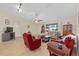 Bright living room with ceiling fan and a view of the entryway at 8237 108Th Street Sw Rd, Ocala, FL 34481