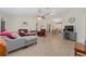 Spacious living room with vaulted ceilings and a view of the dining area at 8237 108Th Street Sw Rd, Ocala, FL 34481