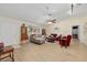 Open-concept living room with ample natural light and comfortable seating at 8237 108Th Street Sw Rd, Ocala, FL 34481