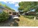 Spacious backyard with a well-maintained lawn and mature trees, offering a serene outdoor setting at 8831 Sw 94Th Ln # H, Ocala, FL 34481