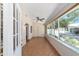 Spacious sunroom with french doors and large windows at 8831 Sw 94Th Ln # H, Ocala, FL 34481
