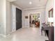 Inviting entryway leads to living spaces and a sunny office, highlighted by tile flooring at 9591 Sw 70Th Loop, Ocala, FL 34481