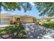 Inviting single-story home with a two-car garage and meticulously maintained landscaping at 9591 Sw 70Th Loop, Ocala, FL 34481