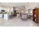 Living area showcasing tile flooring, open concept design, and an inviting seating arrangement with decorative accents at 9591 Sw 70Th Loop, Ocala, FL 34481