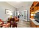 Office with French doors, built-in bookshelves, a desk, and chair offers a refined workspace at 9591 Sw 70Th Loop, Ocala, FL 34481