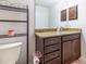 Charming bathroom showcases vanity, granite counters, and modern toilet at 9721 Sw 53Rd Ct, Ocala, FL 34476