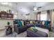 Inviting living room showcasing a comfortable sectional sofa and modern decor at 9721 Sw 53Rd Ct, Ocala, FL 34476