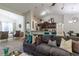 Open-concept living area with bar seating, a comfortable sectional, and a view of the kitchen at 9721 Sw 53Rd Ct, Ocala, FL 34476