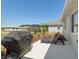Well-maintained backyard featuring a patio with lounge chairs and a grill, perfect for outdoor living at 9764 Sw 81St Ln, Ocala, FL 34481