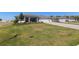 Charming home with a paved driveway, two-car garage, and a spacious lawn in a desirable community at 9764 Sw 81St Ln, Ocala, FL 34481