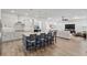 Modern kitchen with a large island, stainless appliances, and an open floor plan to the Gathering room at 9764 Sw 81St Ln, Ocala, FL 34481