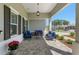 Inviting outdoor patio furnished with comfortable seating, ideal for relaxing and entertaining at 9764 Sw 81St Ln, Ocala, FL 34481