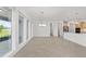 Dining area features tile flooring, natural light from large windows, and backyard views at 9945 Sw 83Rd Ln, Ocala, FL 34481
