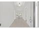 Bright entryway with neutral tile flooring, recessed lighting, and an open view to the living area at 9945 Sw 83Rd Ln, Ocala, FL 34481