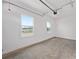 Two windows provide great natural light into this garage at 9945 Sw 83Rd Ln, Ocala, FL 34481
