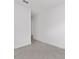 An airy hallway with tile floors and neutral walls invites exploration of the home's layout at 9945 Sw 83Rd Ln, Ocala, FL 34481