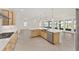 Gourmet kitchen with modern appliances, expansive countertops and an open layout at 9945 Sw 83Rd Ln, Ocala, FL 34481