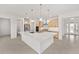 Bright kitchen features stainless steel appliances, large island, and pendant lighting at 9945 Sw 83Rd Ln, Ocala, FL 34481