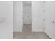 Laundry room featuring tile flooring, hookups, and ample space for laundry appliances at 9945 Sw 83Rd Ln, Ocala, FL 34481