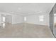 Open floor plan with tile flooring, recessed lighting, and backyard access at 9945 Sw 83Rd Ln, Ocala, FL 34481