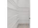 A walk-in pantry features ample wire shelving for optimal storage at 9945 Sw 83Rd Ln, Ocala, FL 34481