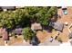 Aerial view of a home highlighting the backyard, surrounding trees, and neighborhood layout at 10 Banyan Track Way, Ocala, FL 34472