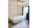 Spare bedroom with wood floors, a ceiling fan, natural light, and computer desk at 10 Banyan Track Way, Ocala, FL 34472