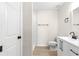 Modern bathroom features a sleek vanity with black hardware and updated shower at 10605 Se 146Th Ln, Summerfield, FL 34491
