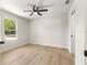 Bedroom with a window provides natural light, creating a warm and inviting atmosphere at 10605 Se 146Th Ln, Summerfield, FL 34491