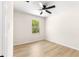 Neutral-toned bedroom featuring a window that fills the room with natural light at 10605 Se 146Th Ln, Summerfield, FL 34491