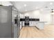 Spacious kitchen boasts white cabinets, modern appliances, and an open layout at 10605 Se 146Th Ln, Summerfield, FL 34491